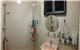Spacious washing room with warm water for shower and face washing.